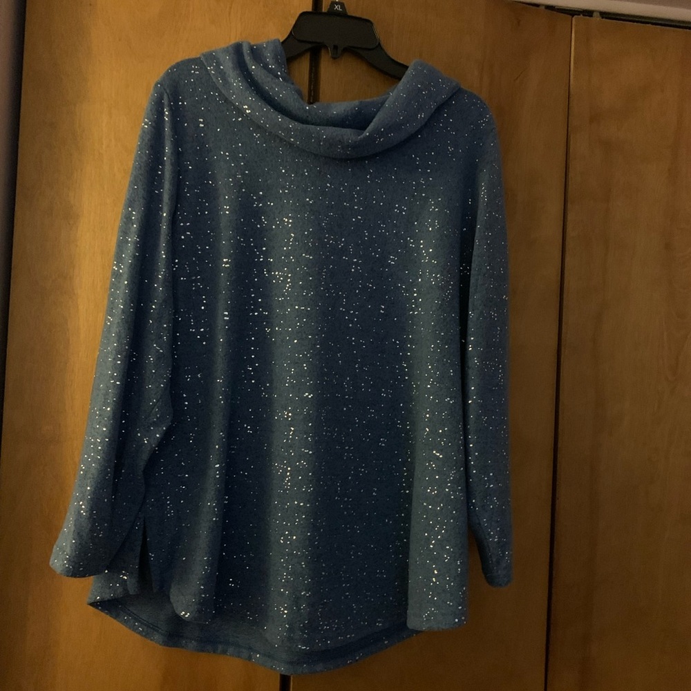 Cute blue with imbedded sparkles. Super warm and soft.
